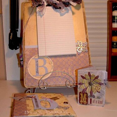 Altered clipboard, Brag Book, and card