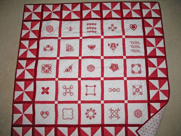 Red Embroidered Quilt