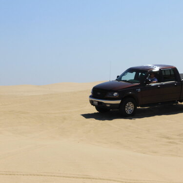 Hubby driving his truck on Pismo Dunes