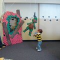 Kai hitting his ninja turtle pinata