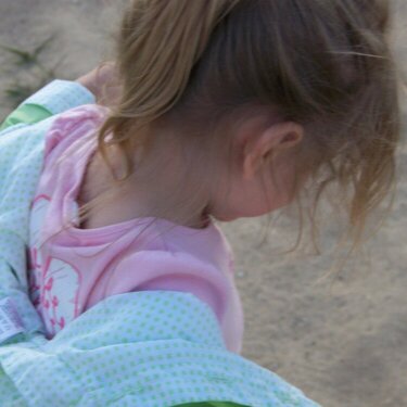 Kiara playing in the sand at the apt