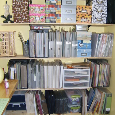 New shelves installed and stocked, on the wall to the left of my worktable you can see the previous in Scraproom 2.