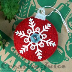 Snowflake stitched felt ornament