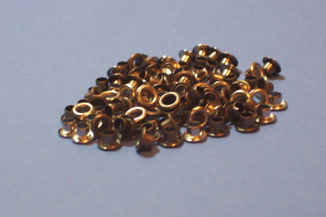 4 sets - 20 pcs. each round metallic eyelets