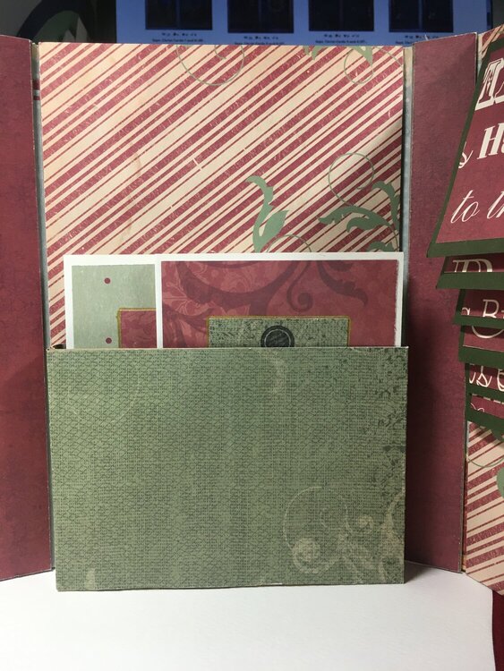 Christmas memory tri-fold book with cards in center pocket standing