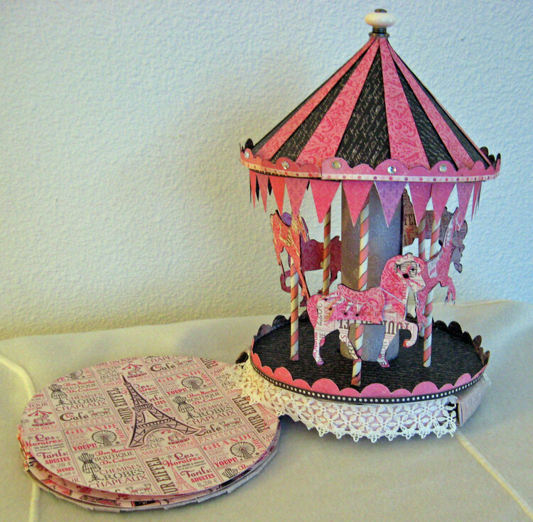 Scrapousel - moving carousel 9 page scrapbook album--album slides out from beneath