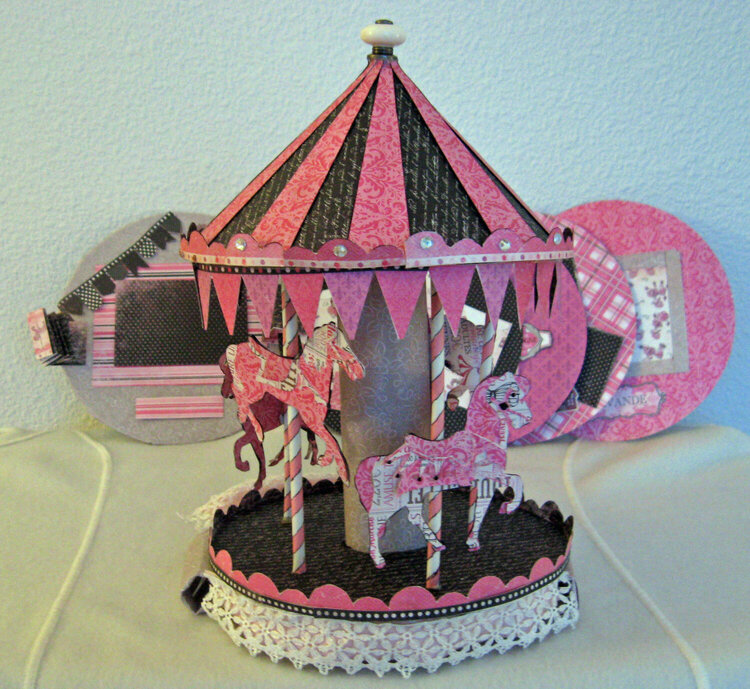 Scrapousel - moving carousel 9 page scrapbook album--everything at a glance