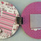 Pages 6 & 7 "Candy Striper" & "Subdued" (lift the perfume bottl label to reveal a 5 page fold-out phot mat)