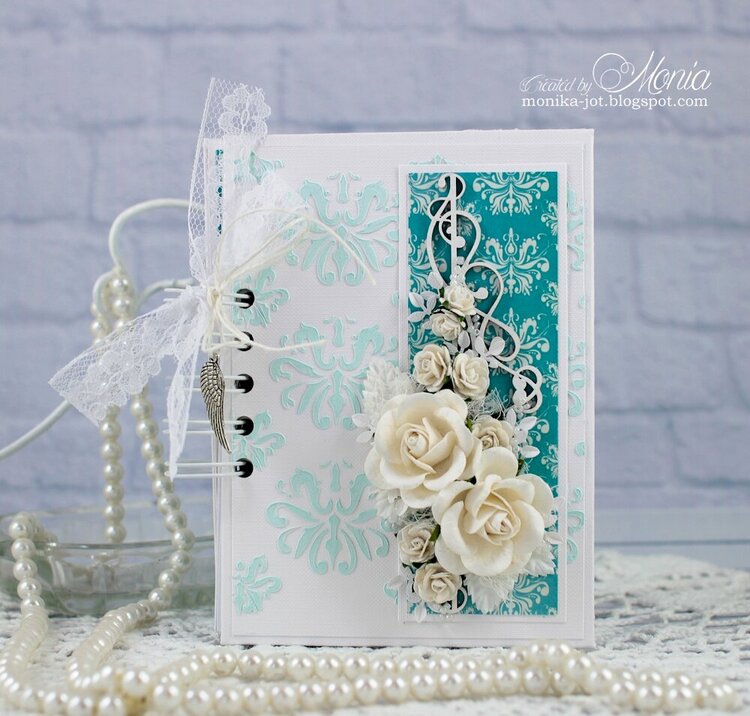 Notebook with white roses
