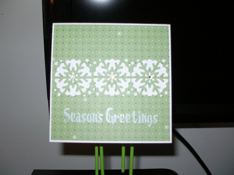 green Christmas snowflake punched