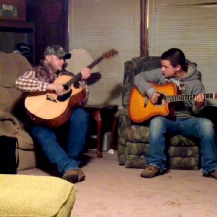 Dustin and Tyler playing guitar